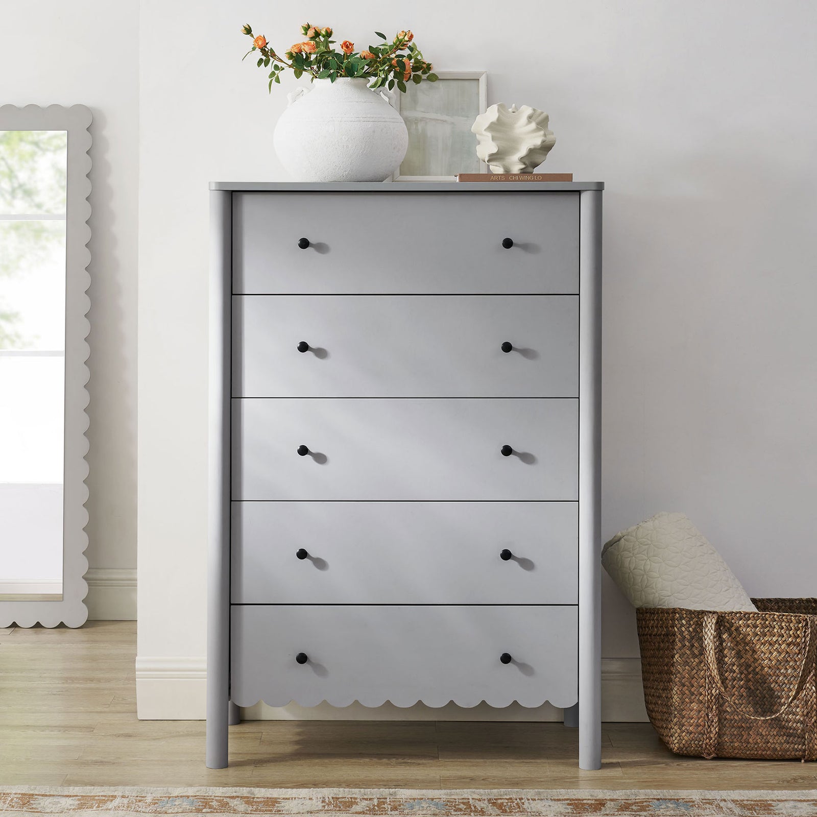 Emmeline light gray scalloped chest styled in a bright airy bedroom with decor || EEI-7156-LGR || front_room