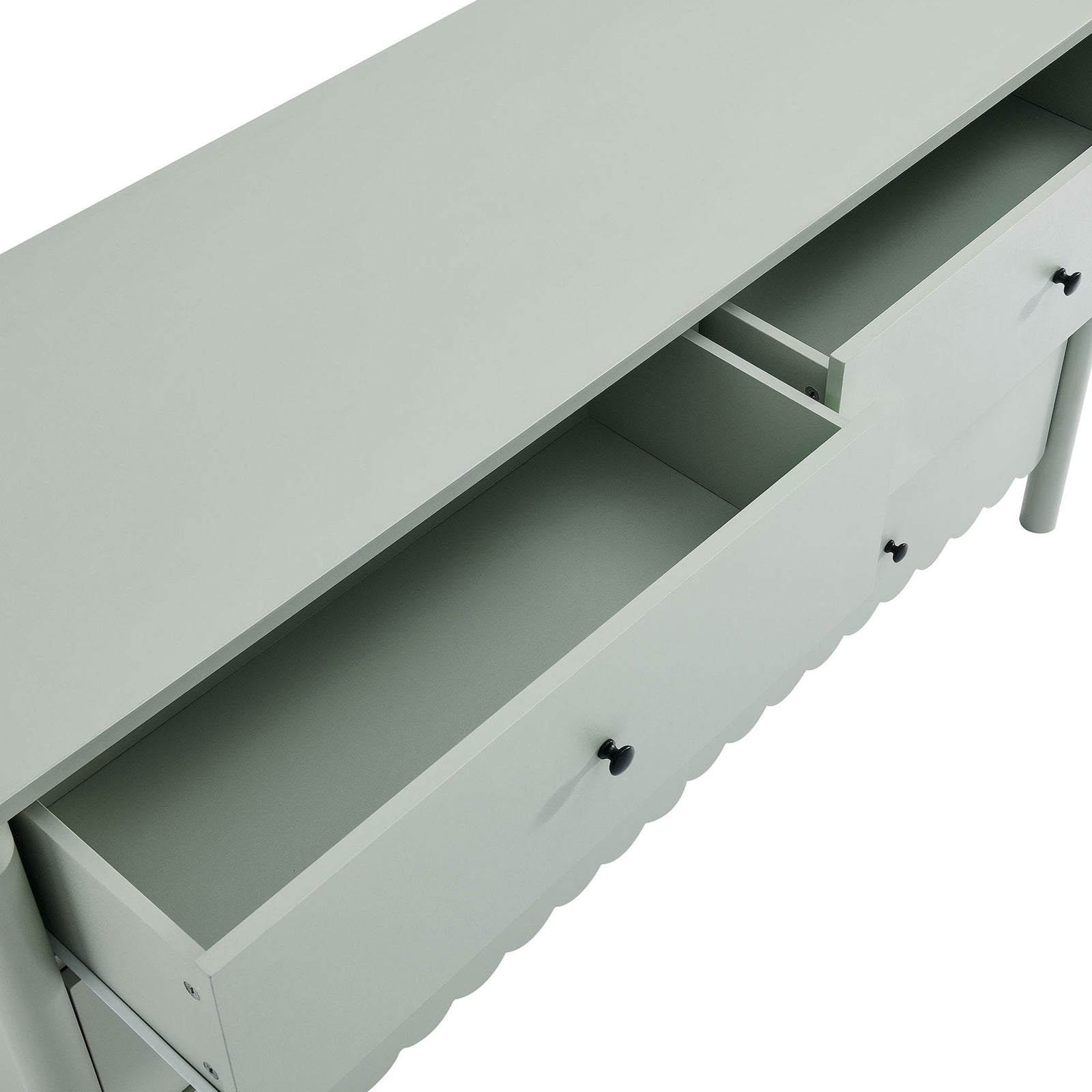 Top drawers pulled open to showcase organized storage space inside the scalloped sage green dresser. || EEI-7157-SGE || storage_open_studio