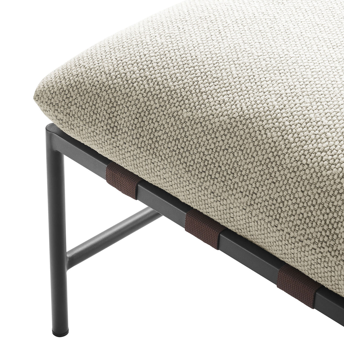 Ivory boucle upholstery and rich strap accents bringing crisp tailored detail to this outdoor ottoman || EEI-7161-IVO || detail_studio