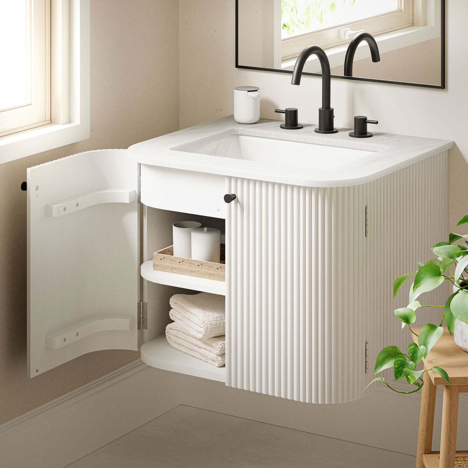 Door storage keeps towels and essentials organized within easy reach || EEI-7162-IVO || front_angle_open_room