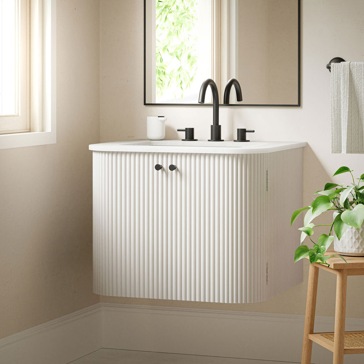 Floating design frees up floor space for a clean, airy bath || EEI-7162-IVO || front_angle_room