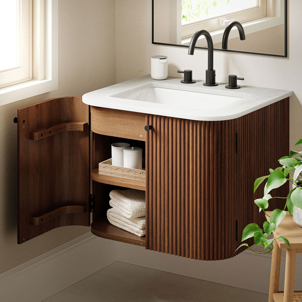 Open doors reveal neatly organized shelves, keeping everyday bath essentials within easy reach. || EEI-7162-WAL || front_angle_open_room