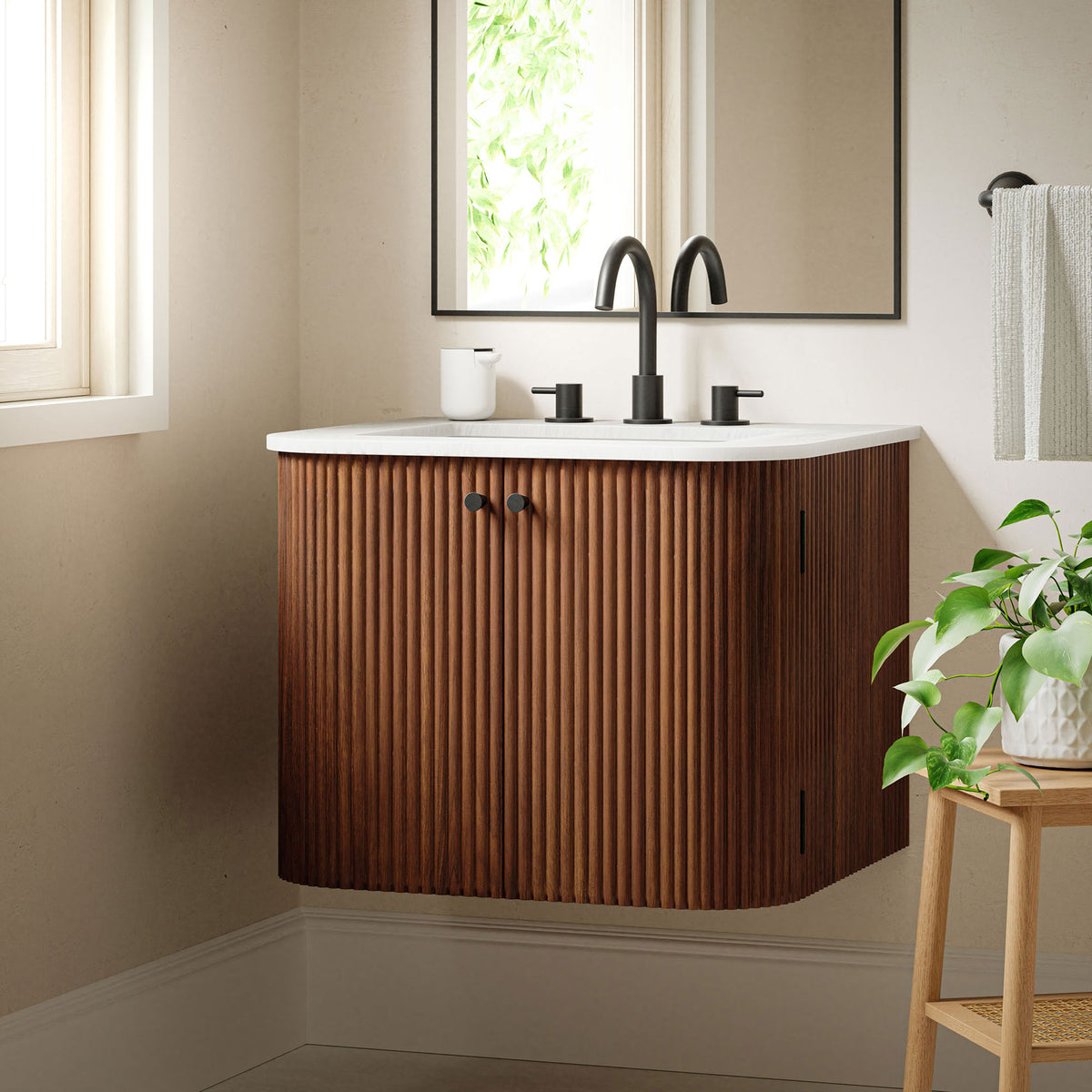 Floating vanity brings rich walnut texture and bright marble elegance to the bath. || EEI-7162-WAL || front_angle_room
