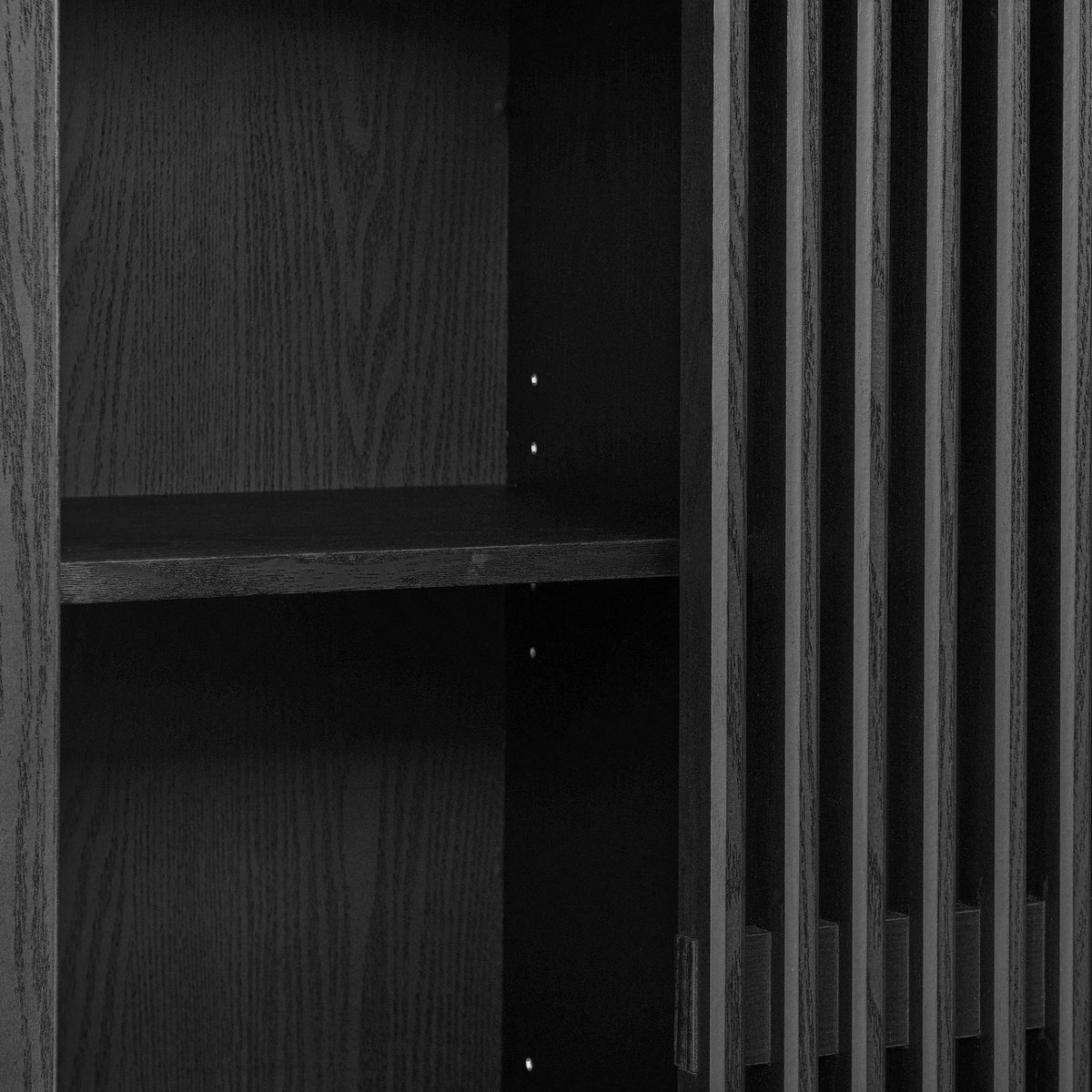 Adjustable interior shelf and slatted door detail on the black arched cabinet. || EEI-7167-BLK || storage_open_studio