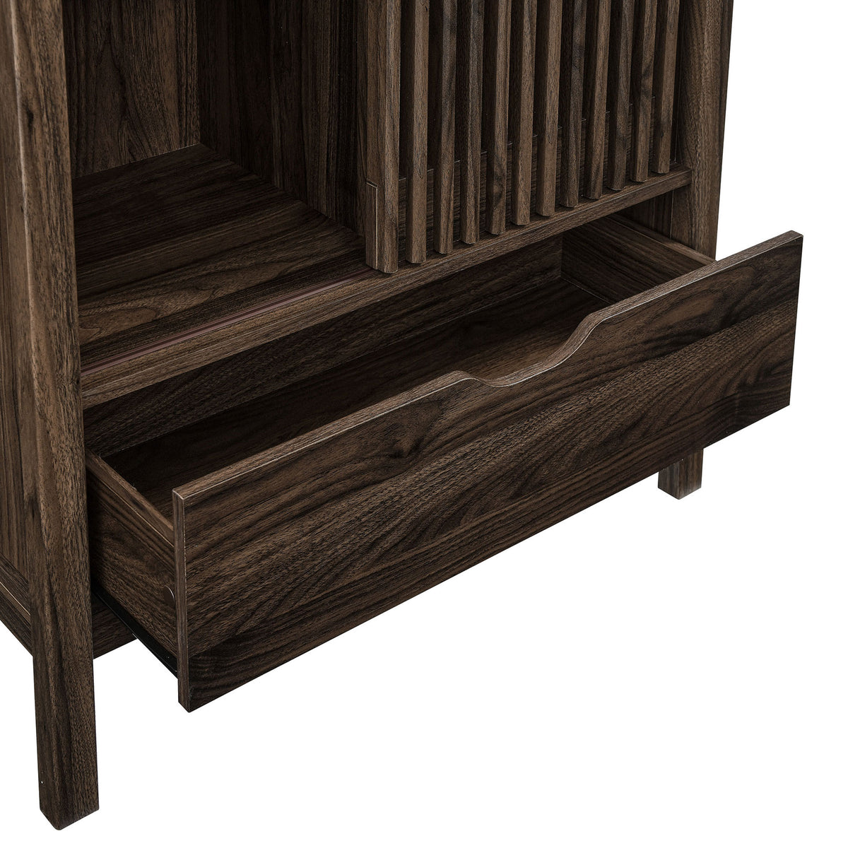 Deep lower drawer on the walnut cabinet offers generous hidden storage space. || EEI-7167-WAL || storage_open_studio