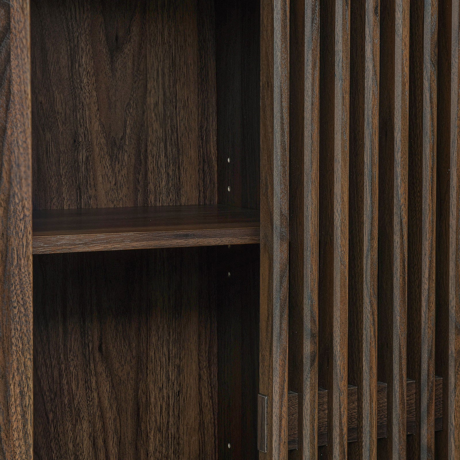 Adjustable interior shelf and slatted door detail on the walnut arched cabinet. || EEI-7167-WAL || storage_open_studio