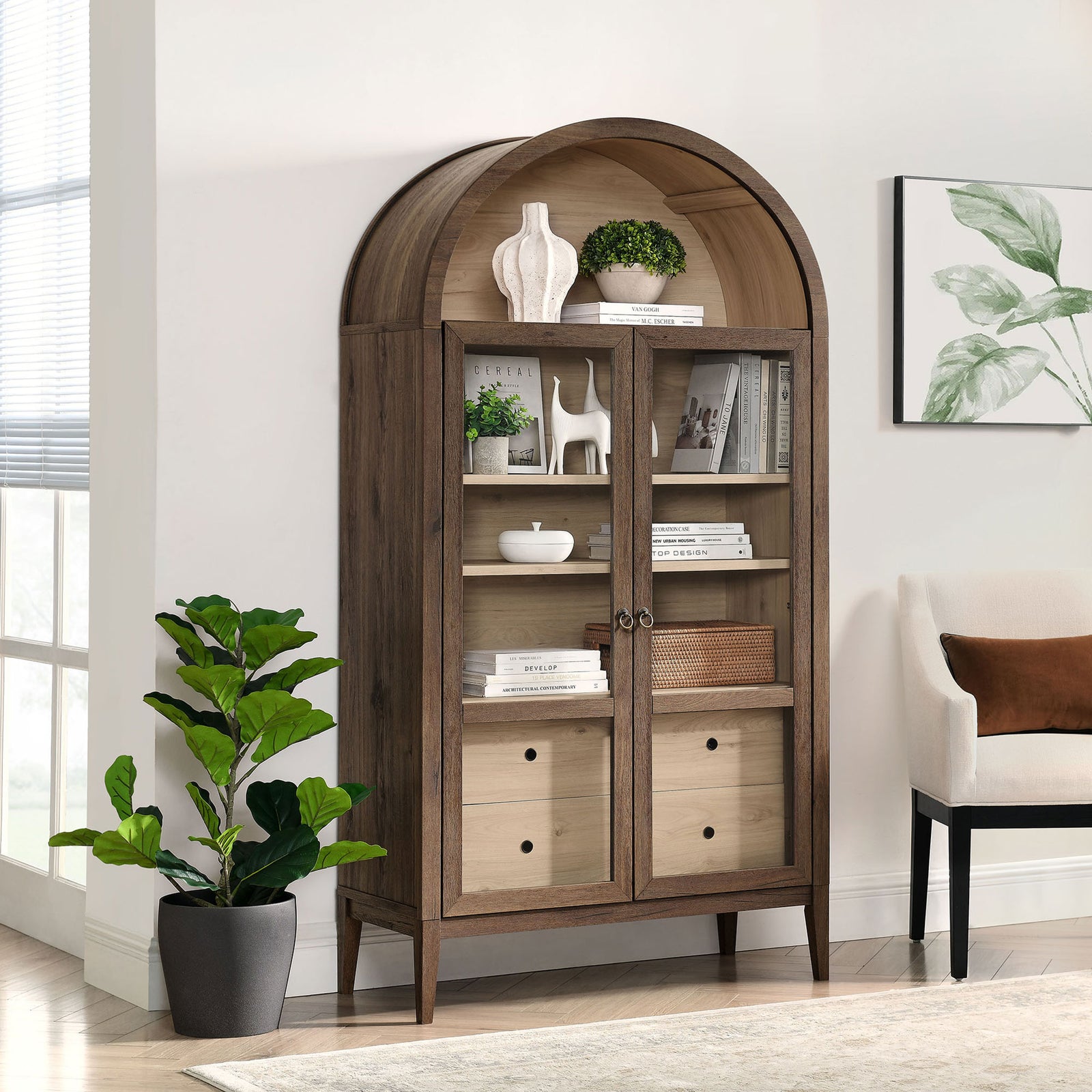 Walnut and light oak arched cabinet styled with greenery, books, and decor in a bright room || EEI-7168-WAL-LOA || front_angle_room