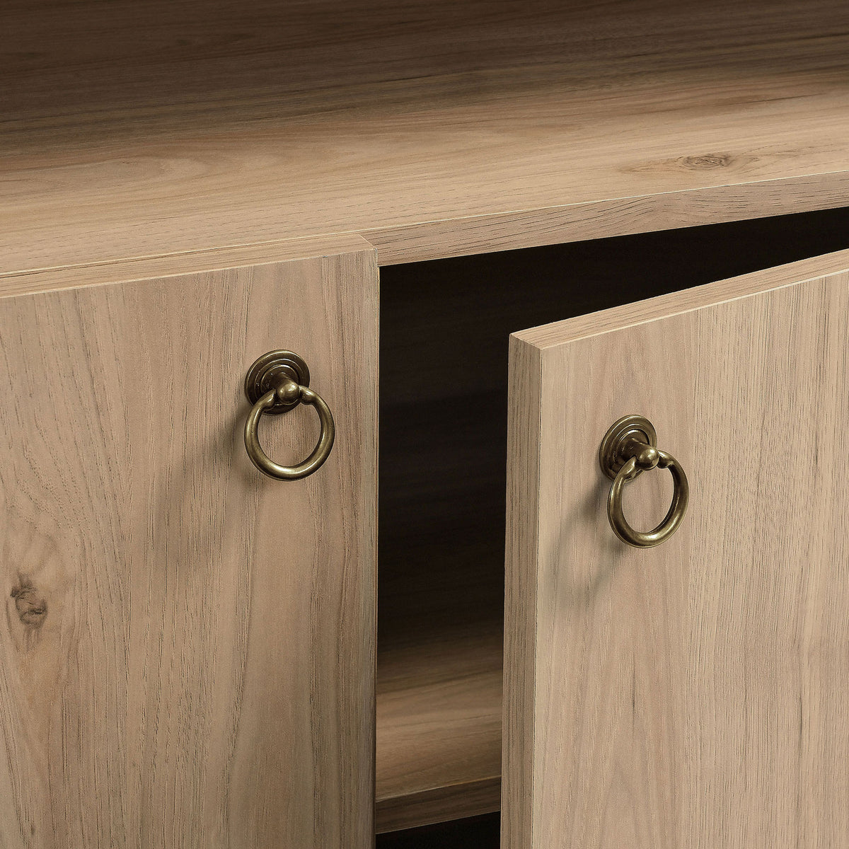 Brushed gold ring pull handles add a refined touch to the cabinet doors || EEI-7169-LOA || handle_studio