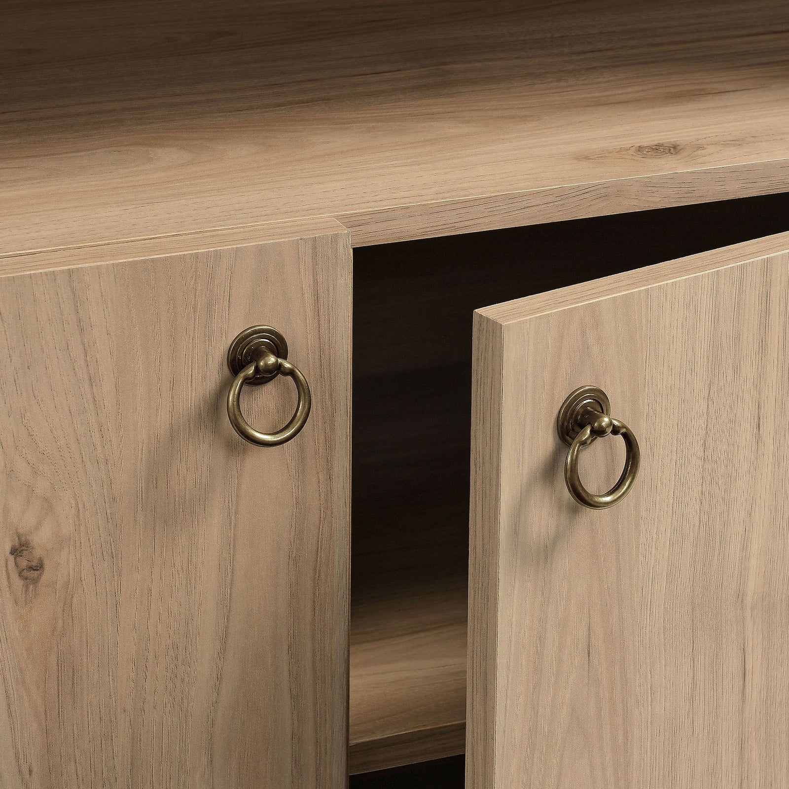 Brushed gold ring pull handles add a refined touch to the cabinet doors || EEI-7169-LOA || handle_studio