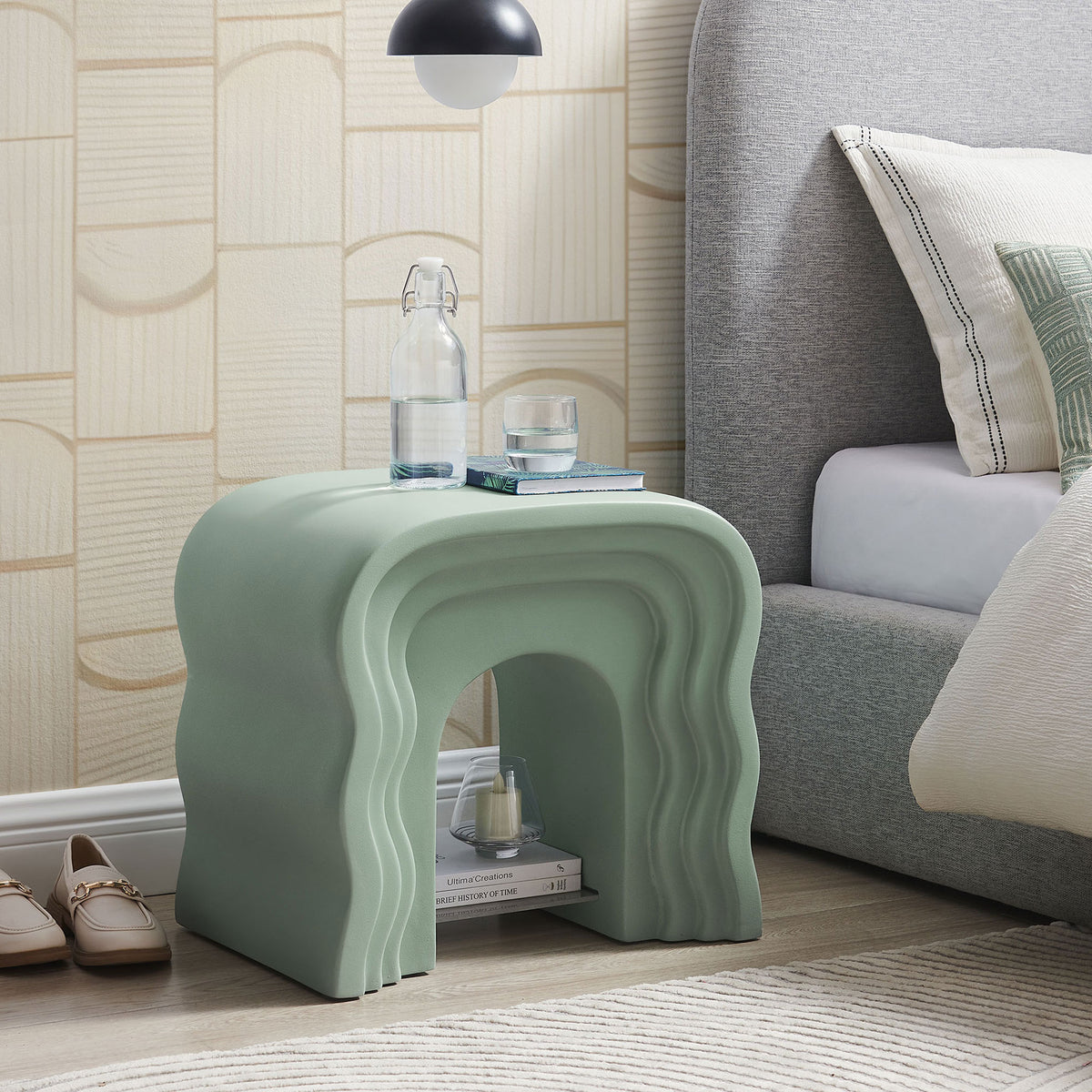 Sage green squiggle side table used as a nightstand with acrylic shelf for bedside storage and decor || EEI-7171-SGE || front_angle_room