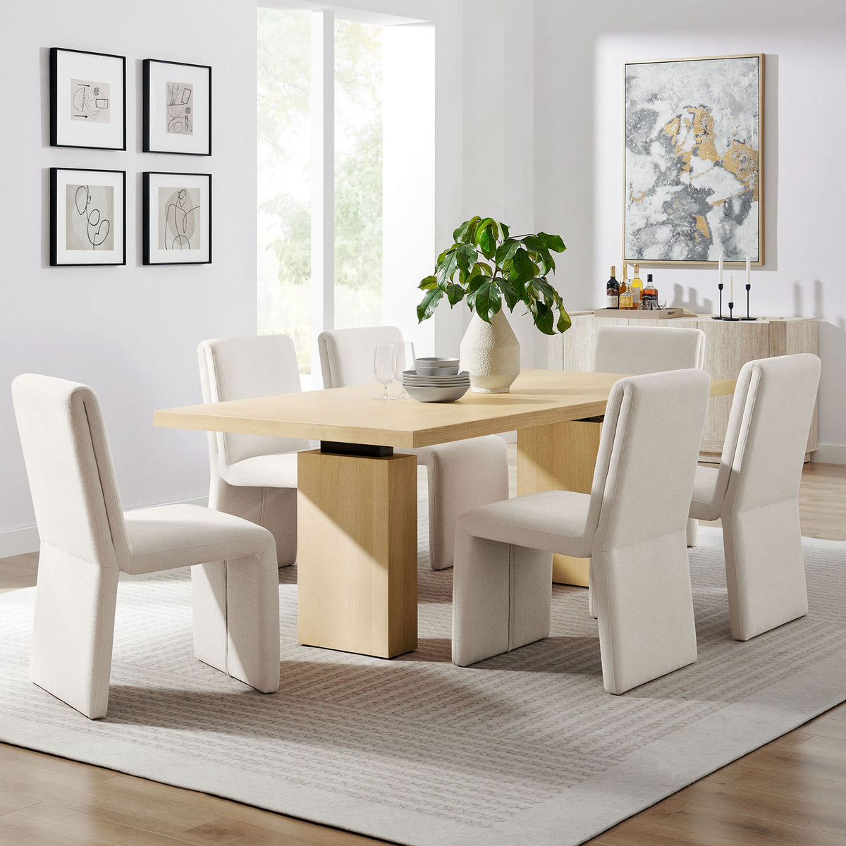 Natural wood dining table anchors a modern neutral dining room, comfortably seating six guests || EEI-7173-NAT || front_angle_room