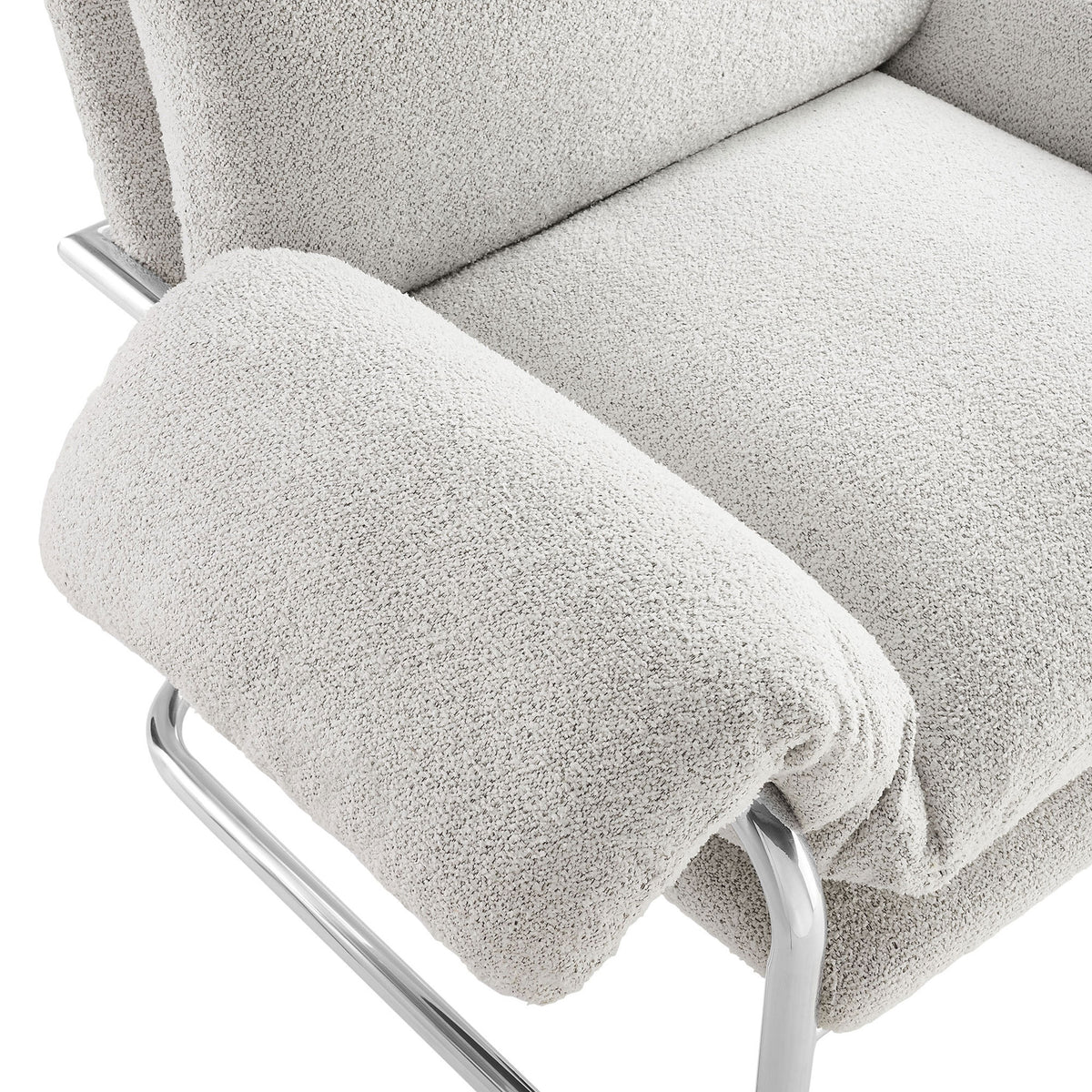Plush boucle armrest meets smooth chrome-finished frame for cushioned comfort. || EEI-7180-NPT || detail_studio
