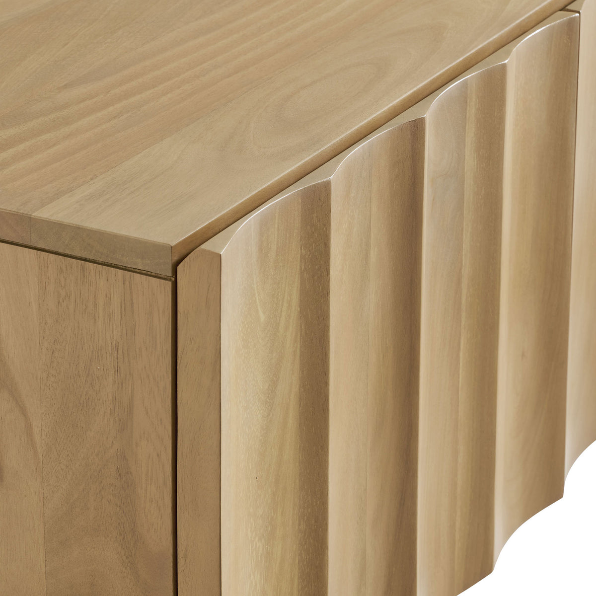 Textured scalloped natural wood doors and smooth top surface detail of the Sorren TV stand || EEI-7183-NAT || detail_studio
