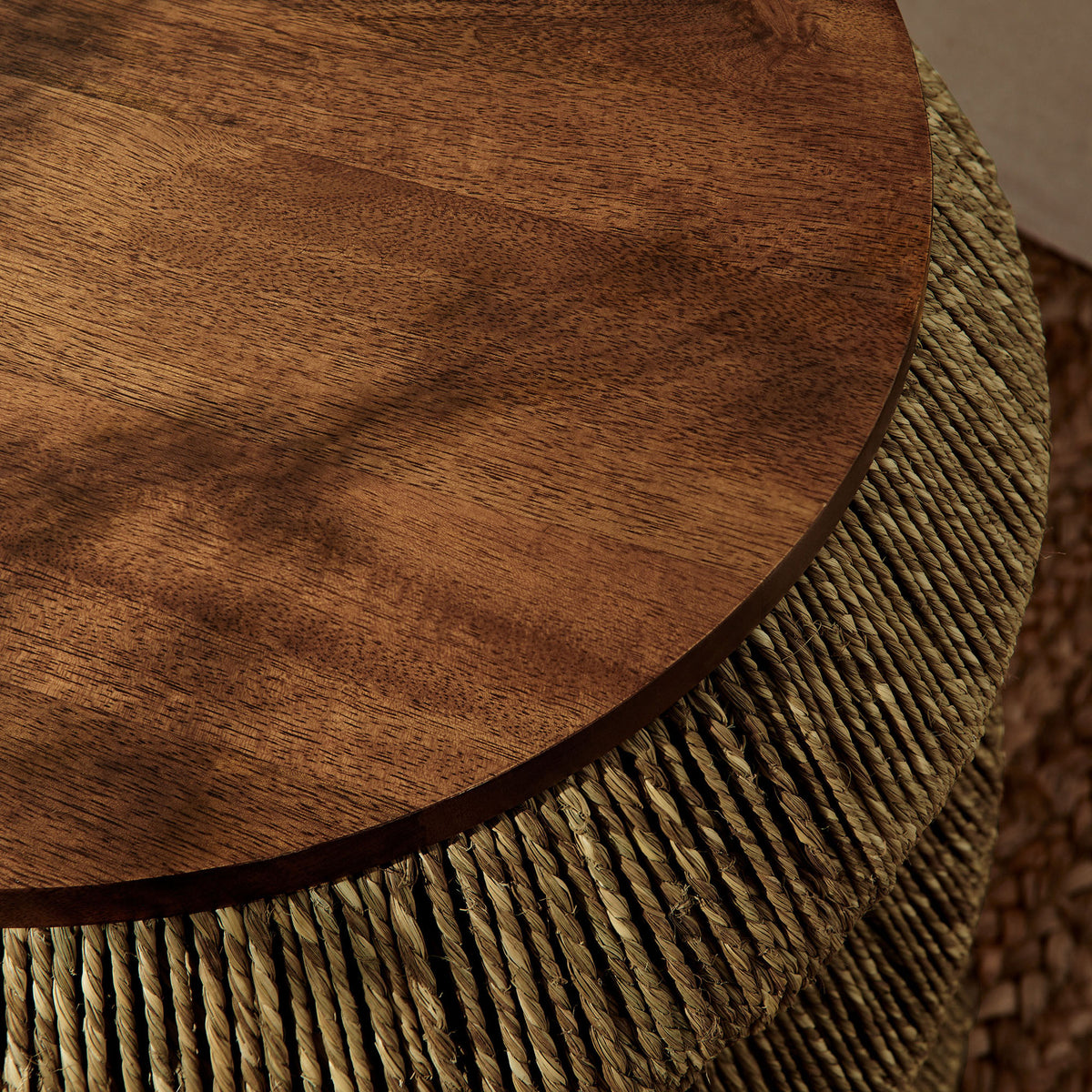 Warm wood tabletop and seagrass base styled on natural jute rug || EEI-7188-WAL-NAT || detail_room