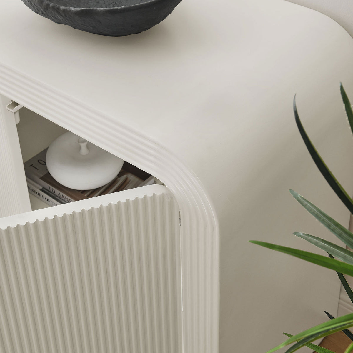 White sideboard styled with decor and greenery, showing an open door and adjustable interior shelf || EEI-7198-IVO || storage_open_room