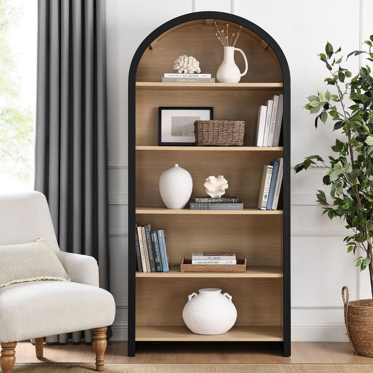 Arched wide bookcase elevates a living space with a bold black frame and natural oak interior || EEI-7202-BLK-OAK || front_angle_room