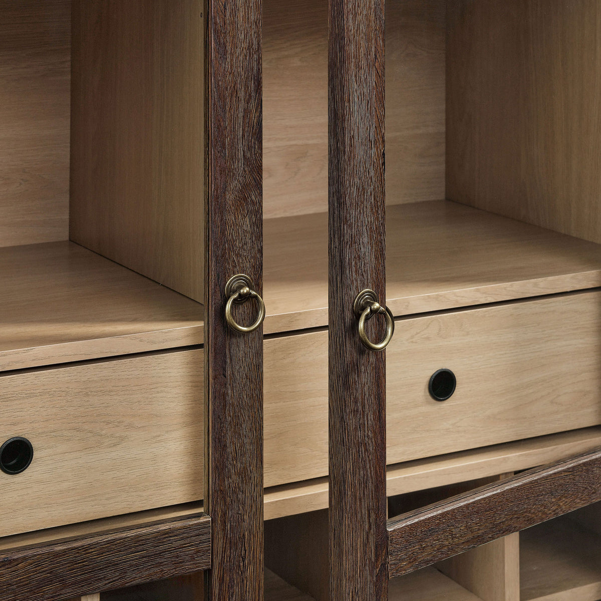 Brushed gold ring pulls and soft-close hinges add a refined, easy-access touch || EEI-7203-WAL-LOA || handle_studio