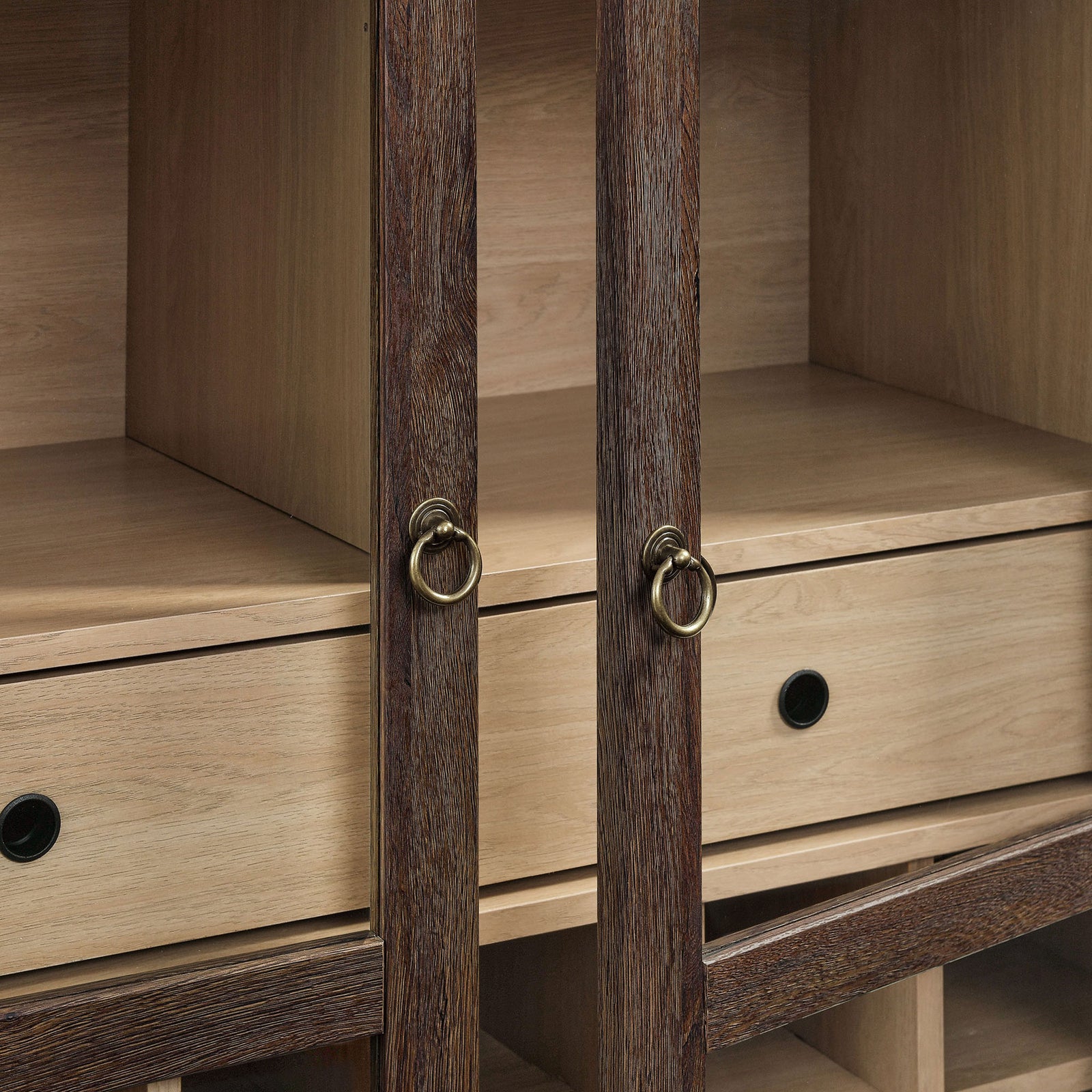 Brushed gold ring pulls and soft-close hinges add a refined, easy-access touch || EEI-7203-WAL-LOA || handle_studio