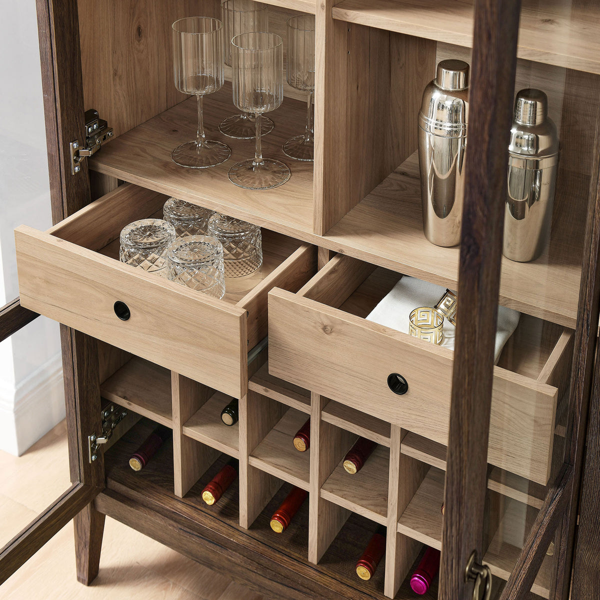 Practical bar storage with stemware rack, drawers, and bottle grid for curated entertaining || EEI-7203-WAL-LOA || storage_open_room