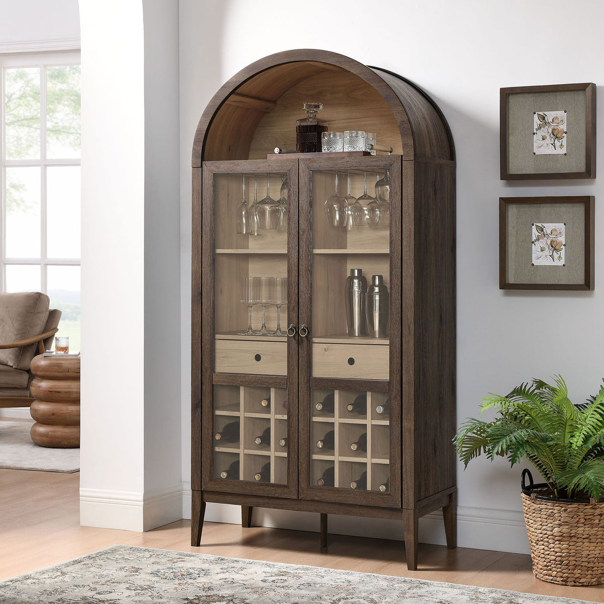 Statement arched bar cabinet elevates the room with glass-front display and ample storage || EEI-7203-WAL-LOA || front_angle_room