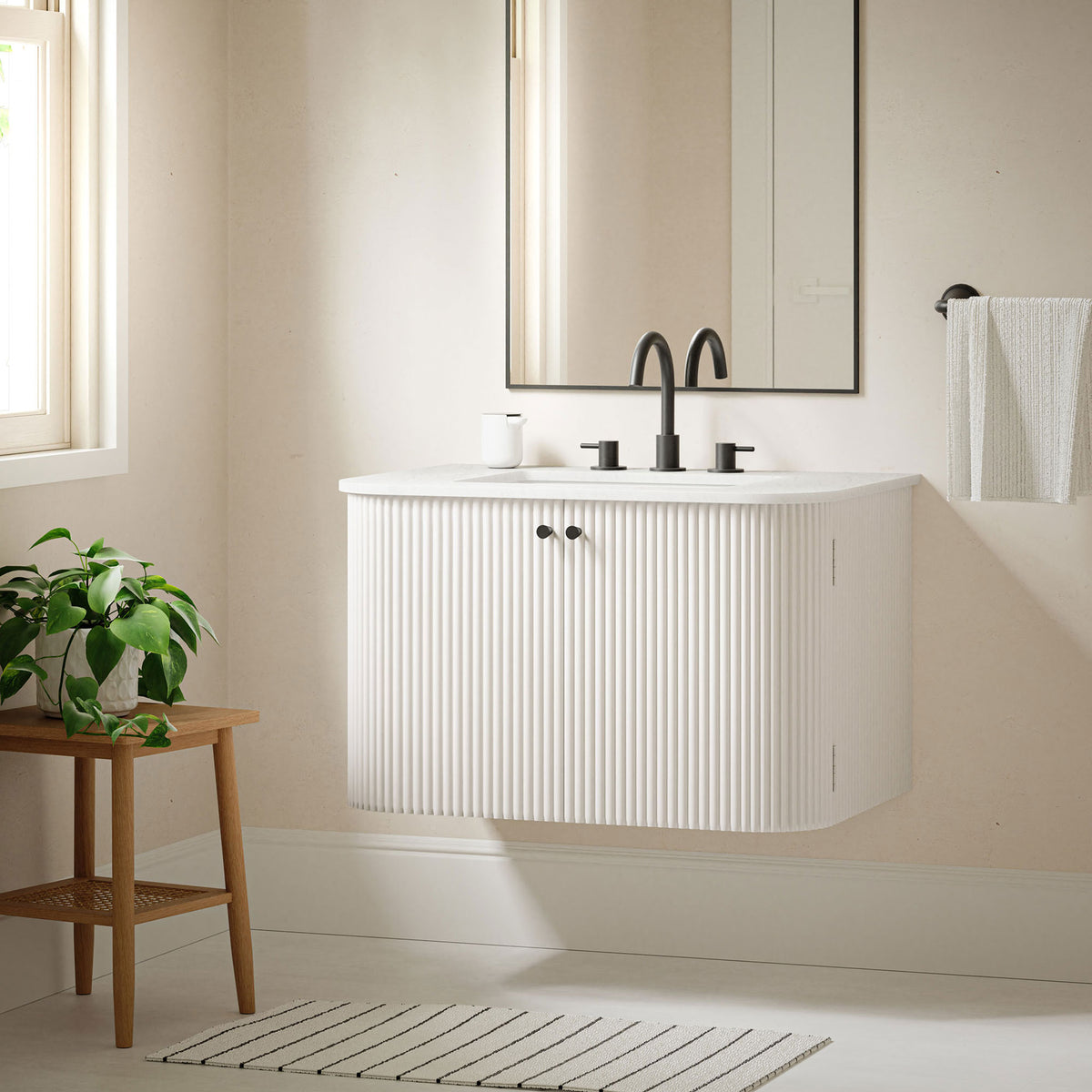 Floating vanity maximizes floor clearance and visual space || EEI-7208-IVO || front_angle_room