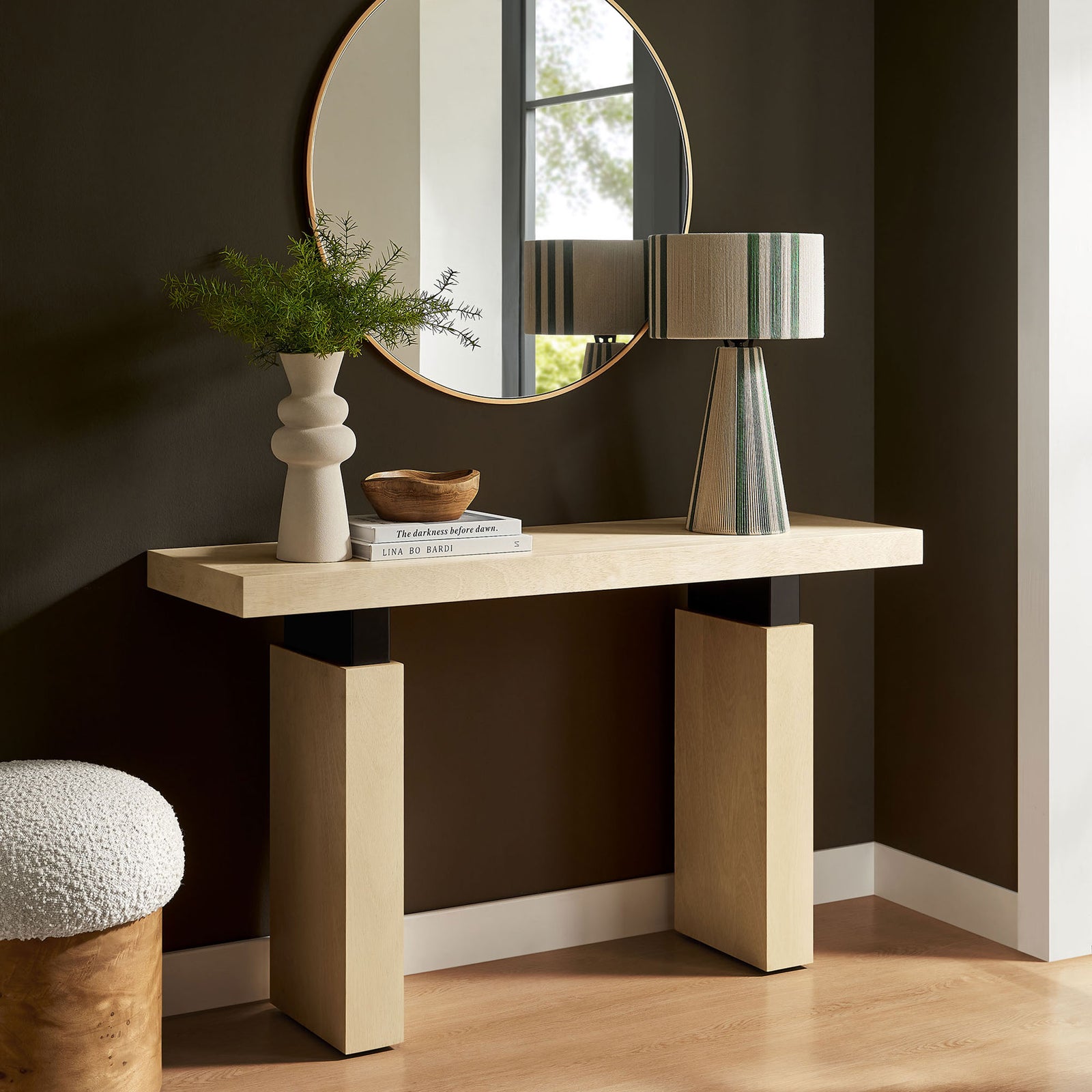 Warm natural wood console table brings modern simplicity with slab legs and striking black accents || EEI-7209-NAT || front_angle_room