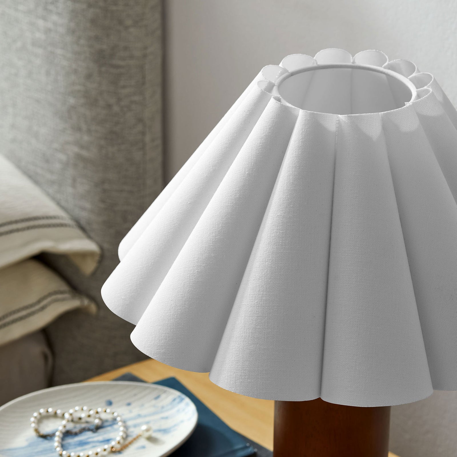 Pleated white shade adding soft sculptural detail to bedside table decor || EEI-7214-WAL || shade_room