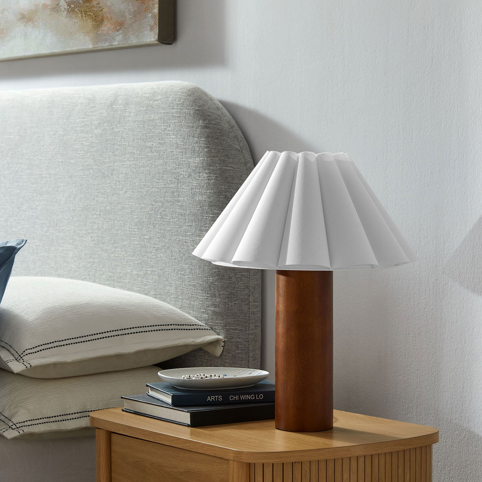 Flora lamp with white petal shade and walnut base styled on modern nightstand || EEI-7214-WAL || front_angle_room