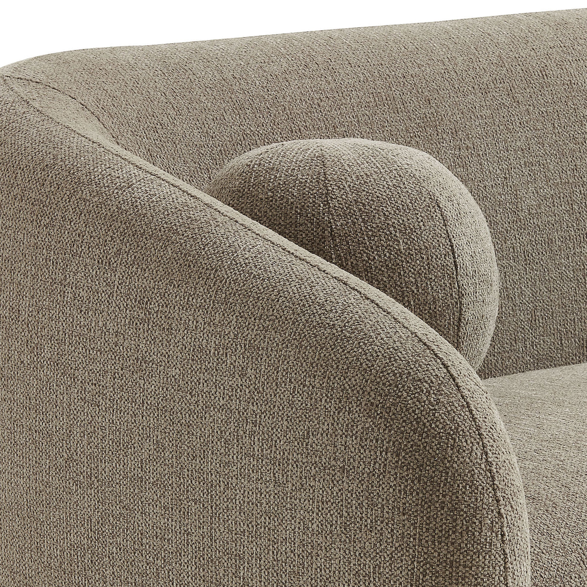 Sofa arm with matching round accent pillow shows the tightly woven chenille texture || EEI-7217-TAU || detail_studio