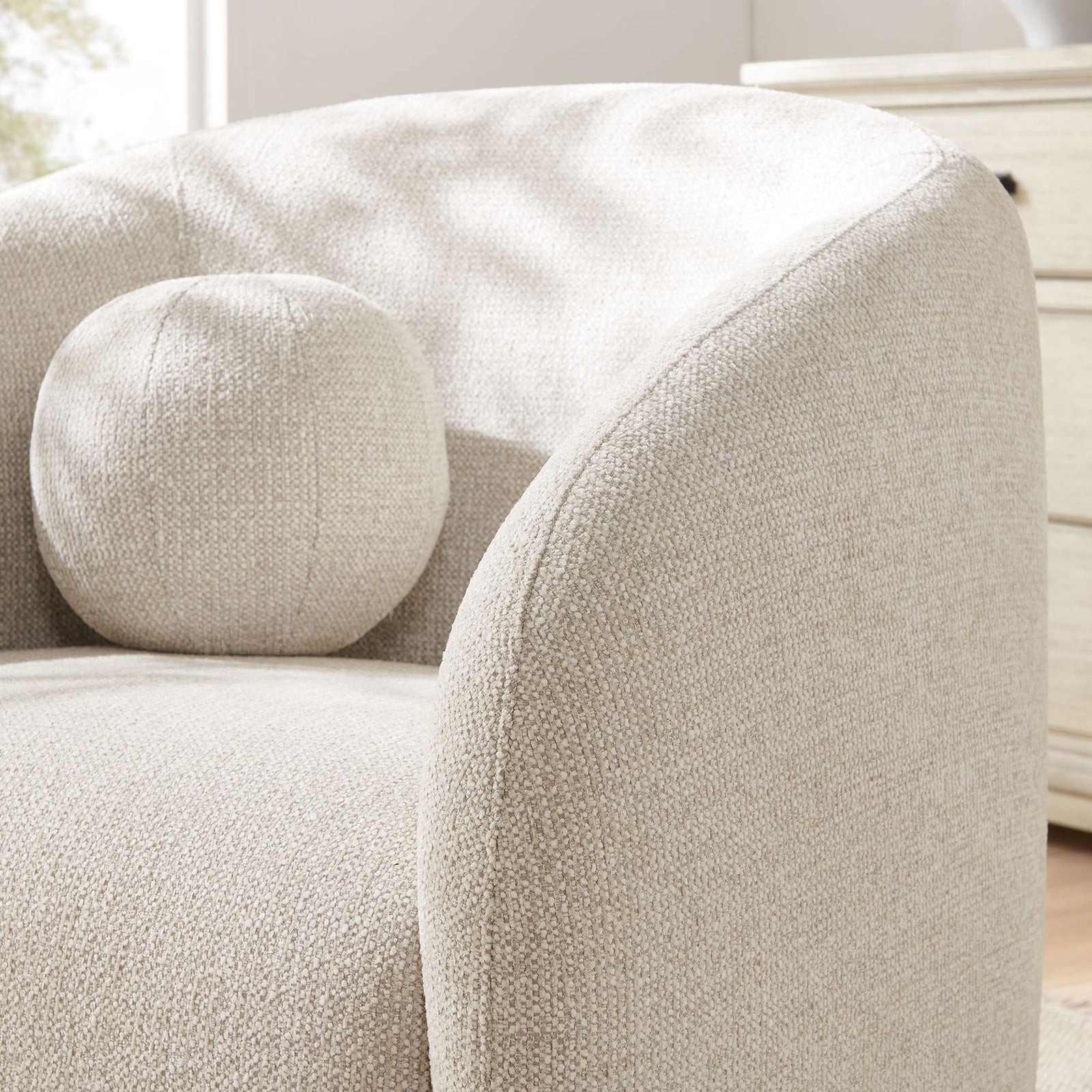 Sunlit texture and plush chenille seat with rounded arm and ball pillow for effortless, cozy style. || EEI-7218-DOV || detail_room