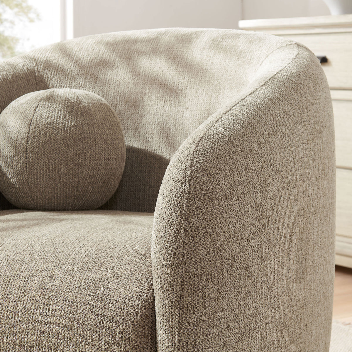 Inviting chenille-like texture and curved armrest bring soft, cozy comfort to the space || EEI-7218-TAU || detail_room