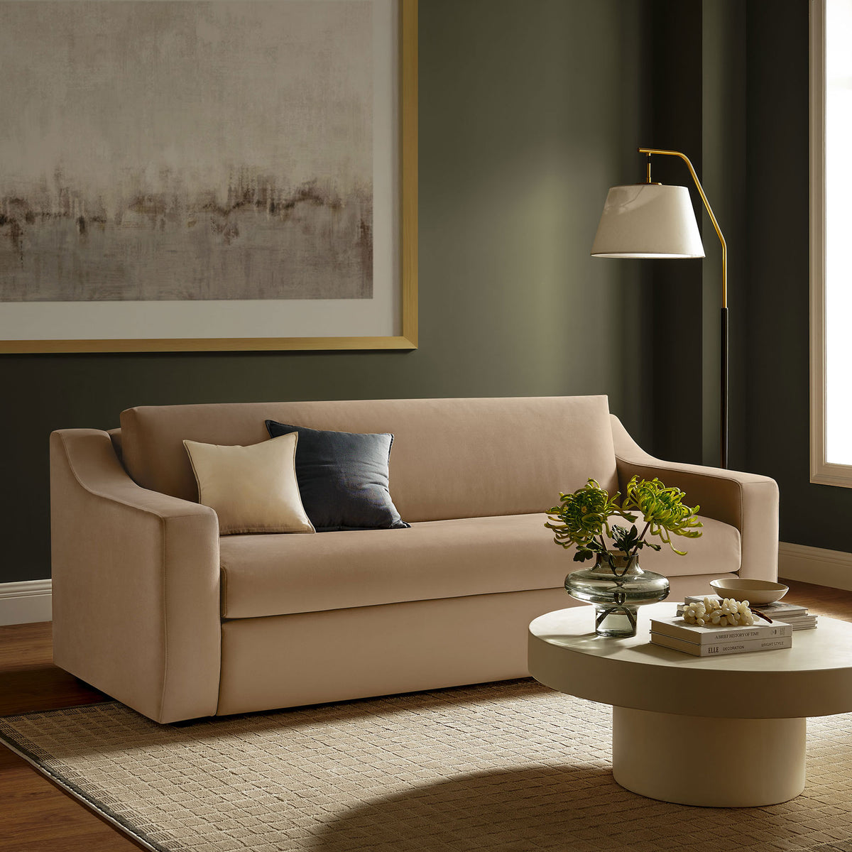 Taupe performance velvet sofa anchors a modern living room with warm tones, layered textures, and soft lighting. || EEI-7219-TAU || front_angle_room