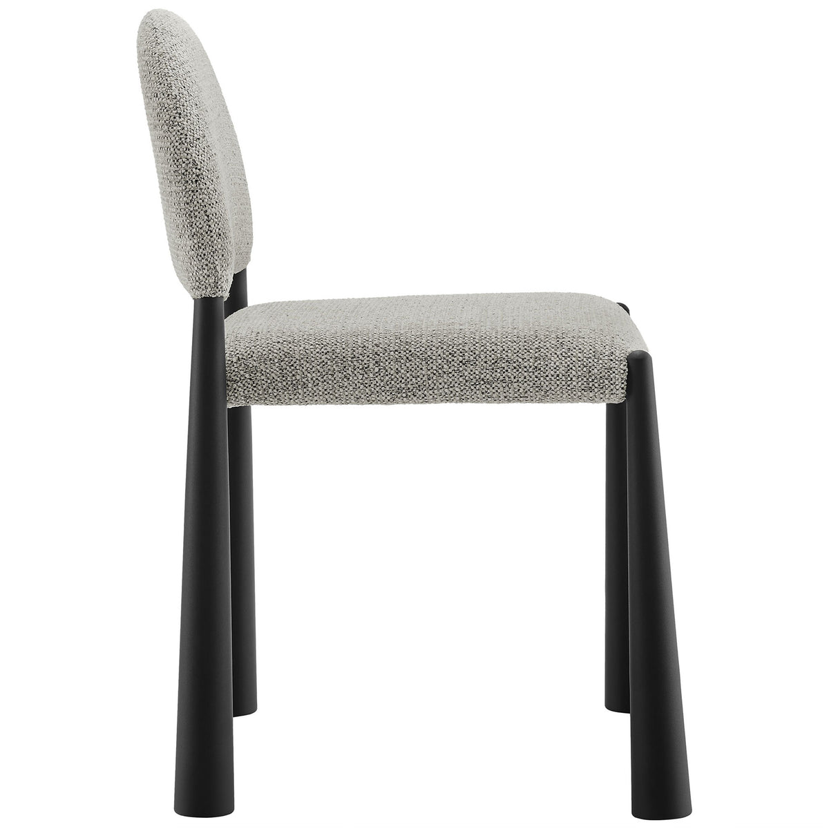 Hayley dining chair highlighting its thick padded seat, curved backrest, and dramatically flared metal legs || EEI-7220-BLK-CAM || side_studio