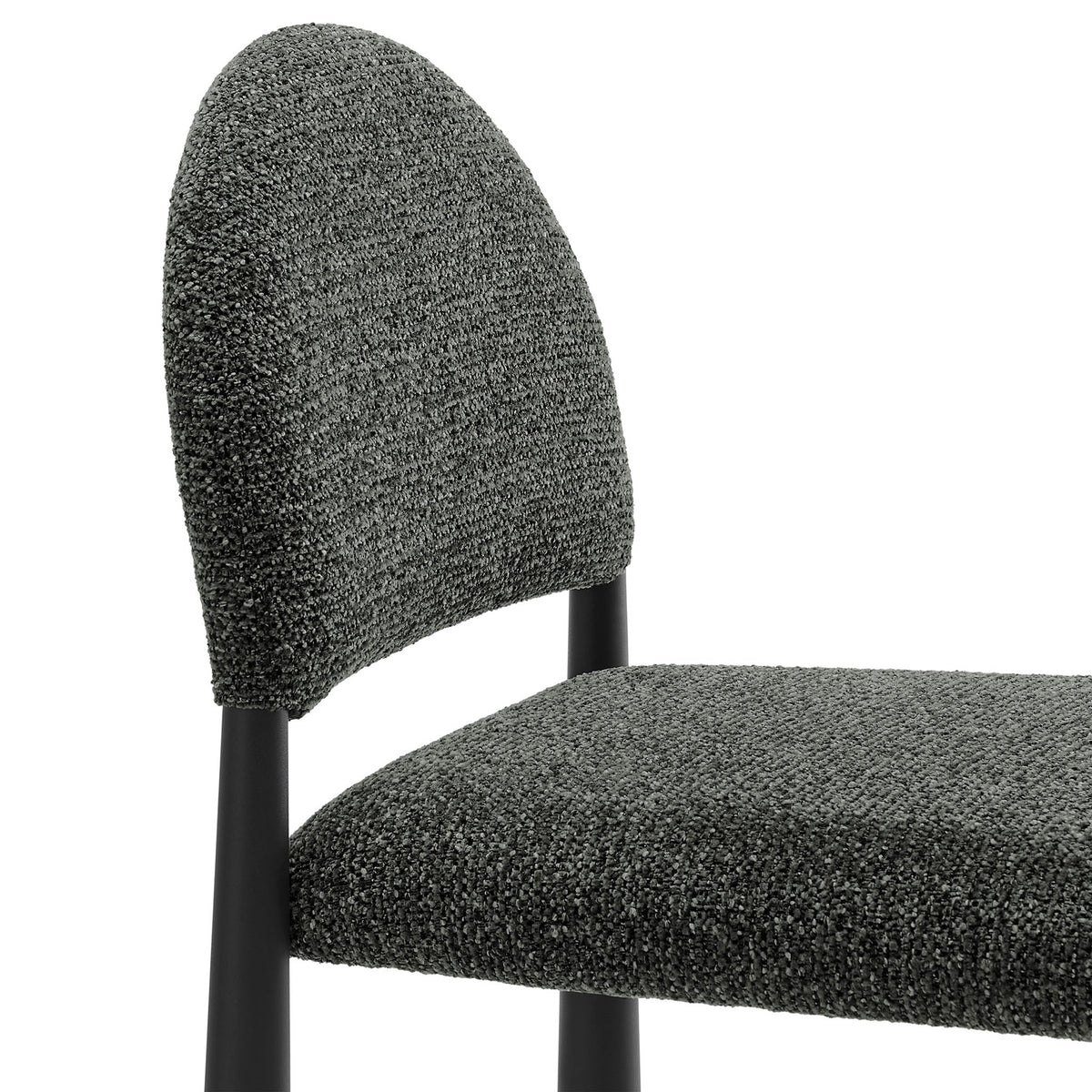 Textured boucle upholstery wraps the softly curved, generously padded backrest. || EEI-7221-BLK-ANT || detail_studio