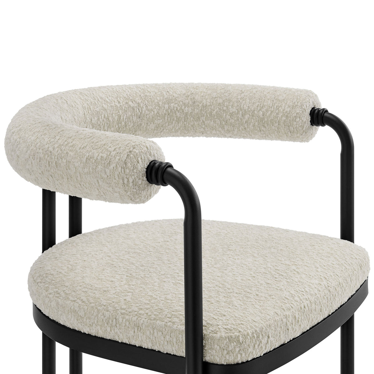 Plush boucle seat and padded rolled backrest create inviting comfort on this modern metal dining chair || EEI-7225-BLK-PRL || detail_studio