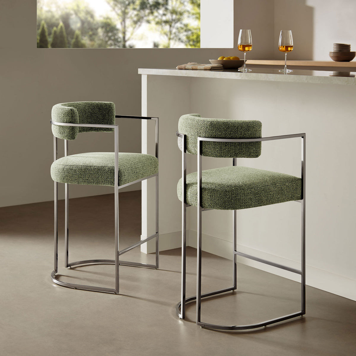 Sleek counter stool brings modern polish to a kitchen island with green fabric and chrome frame || EEI-7227-SLV-LEA || front_angle_room