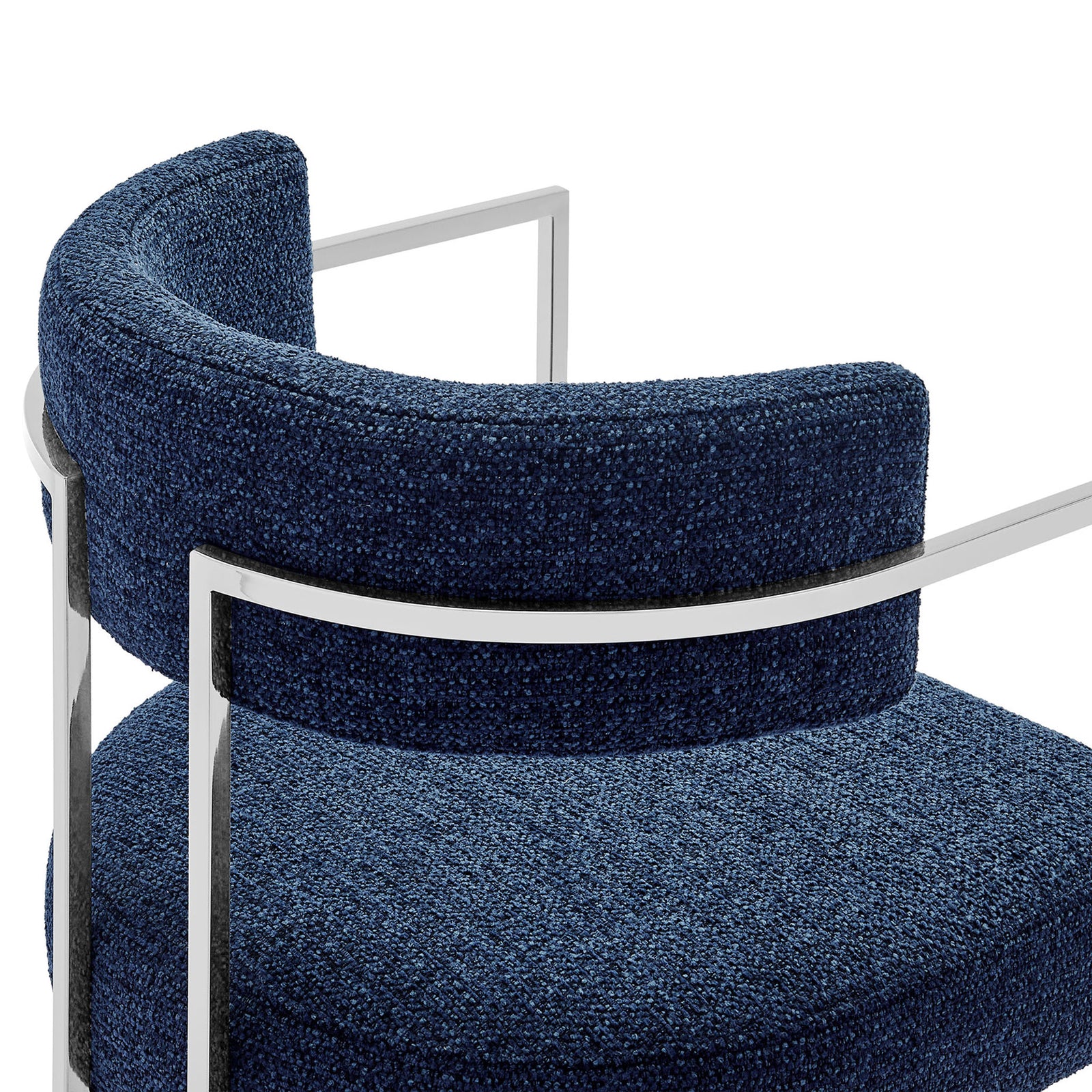 Textured navy woven fabric and polished metal frame on the curved chair back. || EEI-7228-SLV-NAV || detail_studio
