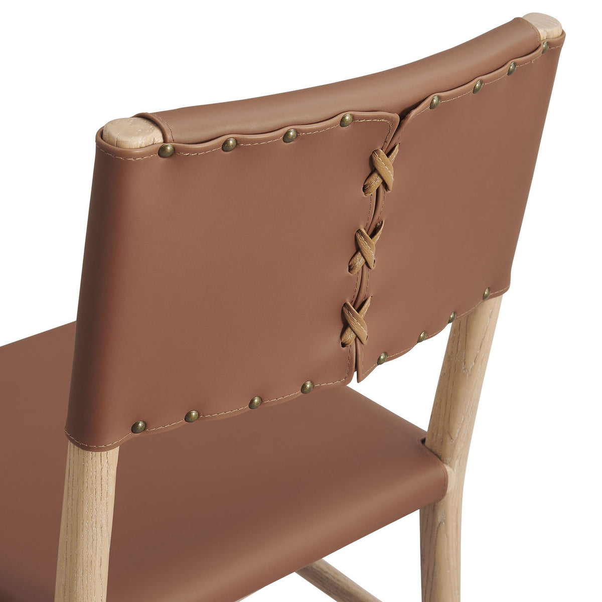 Vegan leather backrest with hand-laced seam and antique-style nailhead trim for artisan character || EEI-7240-NAT-SDL || detail_studio