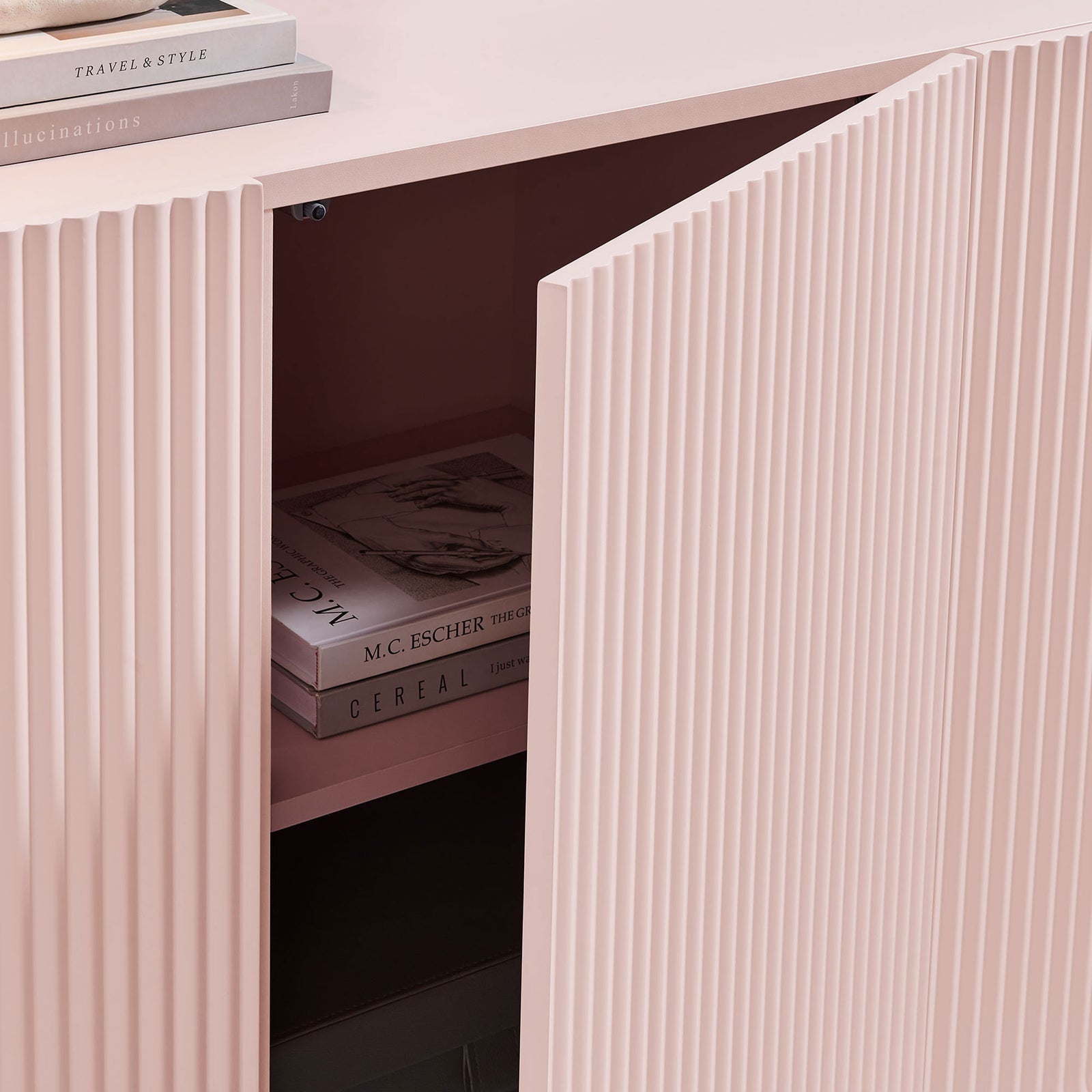 Push-to-open door reveals neatly styled shelves, perfect for books, decor, and everyday essentials || EEI-7241-PNK || storage_studio