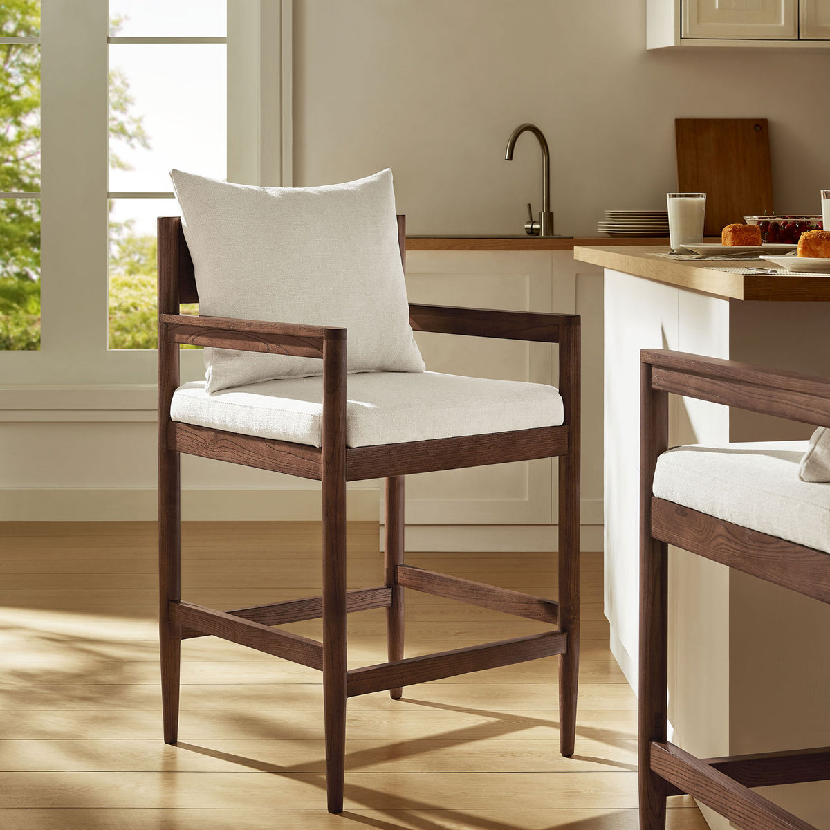 Modern counter stool warms the kitchen with rich wood tones, plush seat, and an easy, open-back silhouette || EEI-7244-SAL || front_angle_room