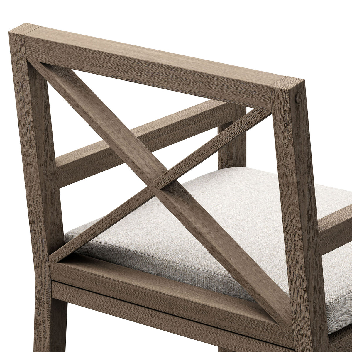 Textured teak grain, crisp X-back joins, and neatly tailored pebble cushion showcase fine craftsmanship. || EEI-7253-WGR-PEB || detail_studio