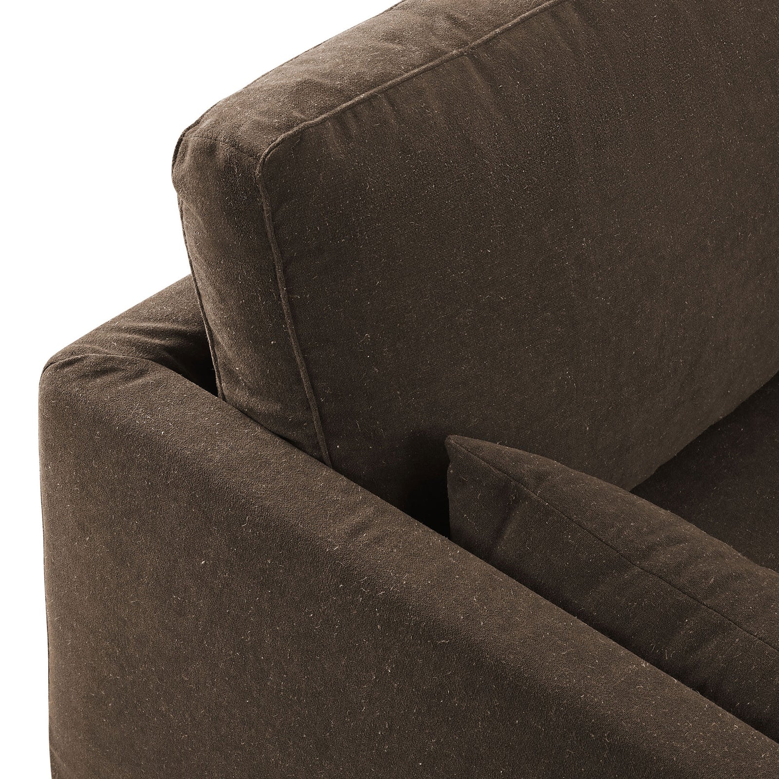 Cocoa linen-blend upholstery with soft back cushion, slim arm, and coordinating bolster pillow detail. || EEI-7260-COA || detail_studio