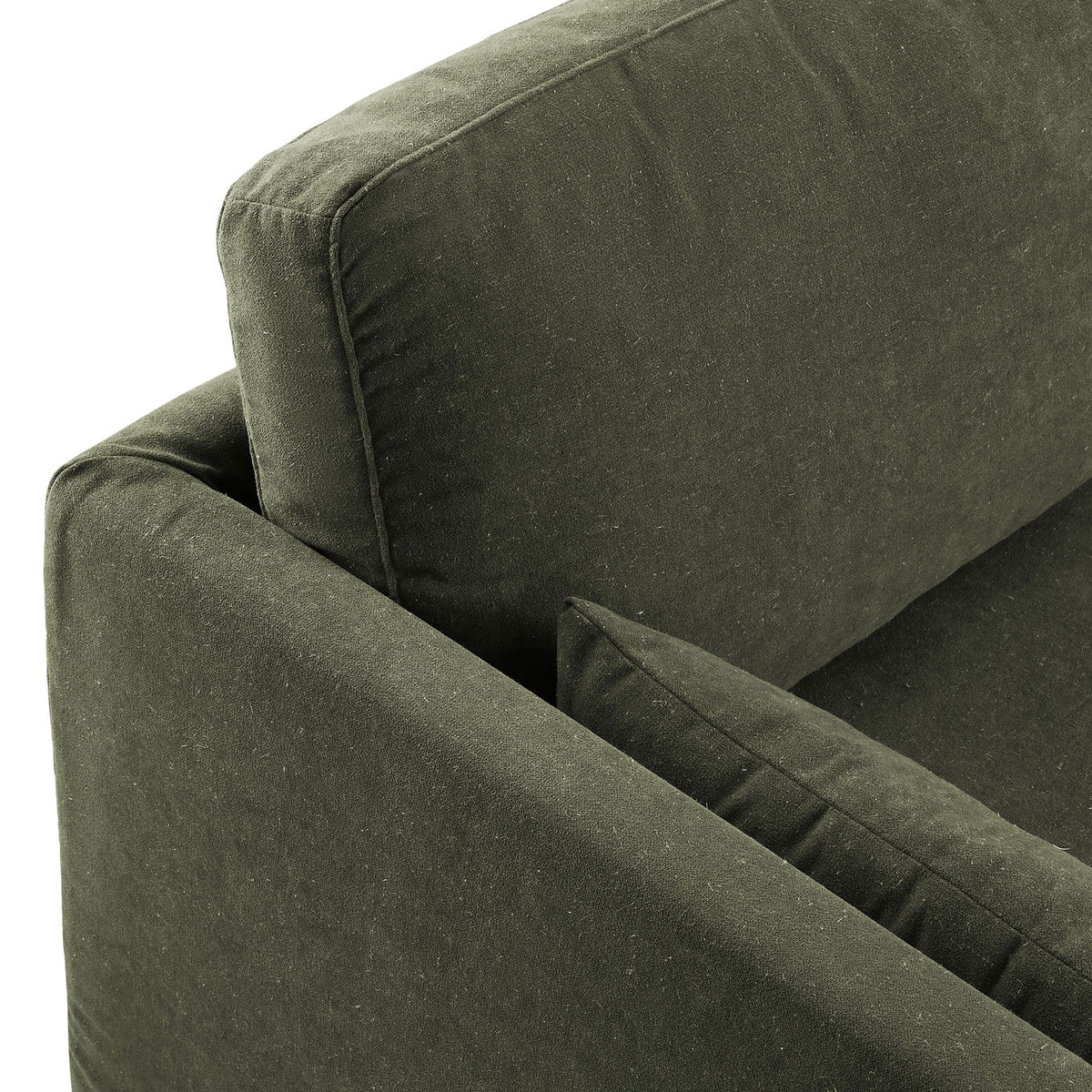 Sage green sofa highlighting the textured fabric, tailored seams, and plush back cushion || EEI-7260-SGE || detail_studio