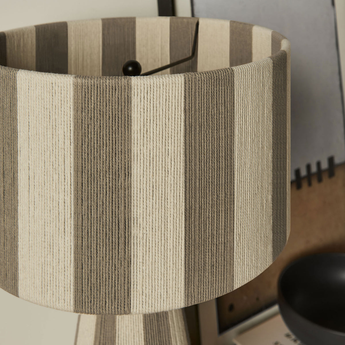 Cobblestone striped shade adds depth and softness against a serene, neutral backdrop. || EEI-7261-COB || shade_room