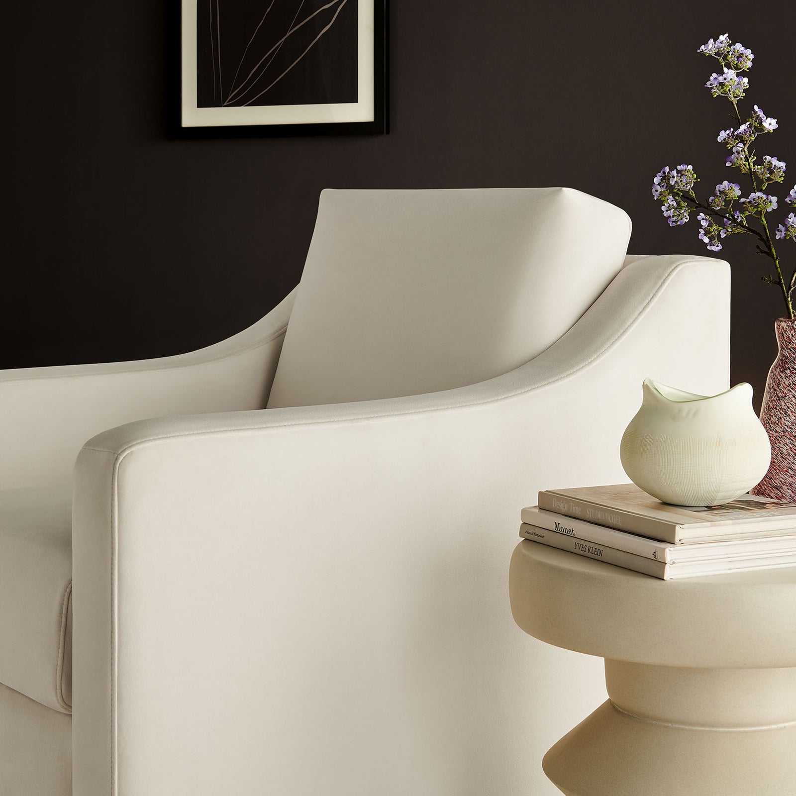 Soft velvet texture and flowing arm design bring a quiet elegance to modern living spaces. || EEI-7282-ALA || detail_room