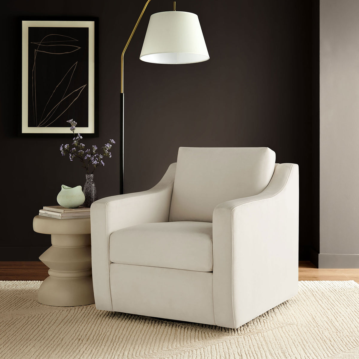 Elevated comfort with a floating swivel base and inviting cushions for a polished living room look. || EEI-7282-ALA || front_room