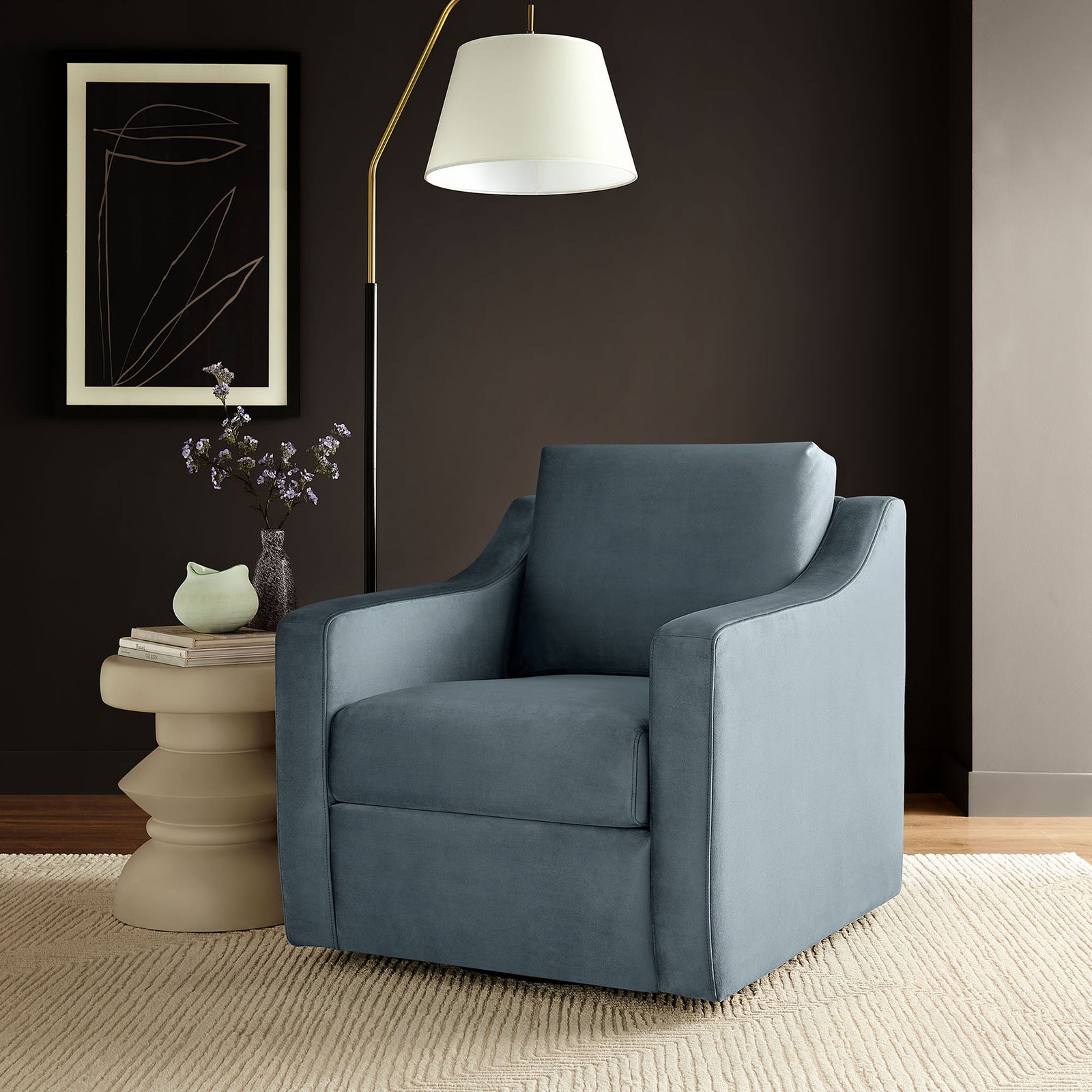 Elegant cadet blue swivel armchair anchors the room with plush comfort and modern poise || EEI-7282-CAB || front_room