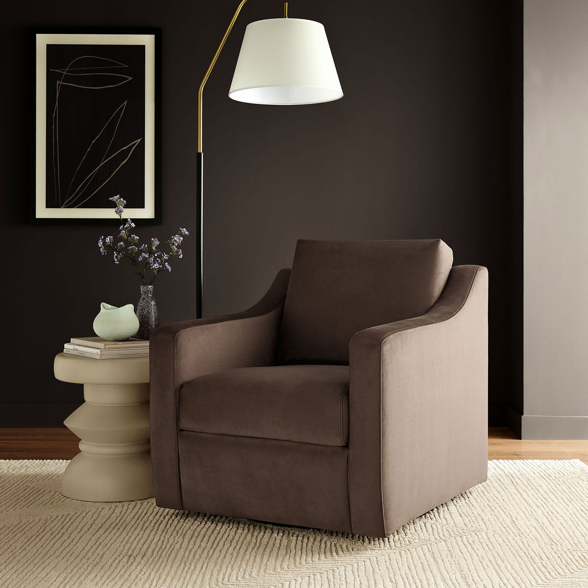 Chocolate velvet swivel armchair with gently curved arms and plush cushions, styled for cozy living spaces || EEI-7282-CHB || front_angle_room