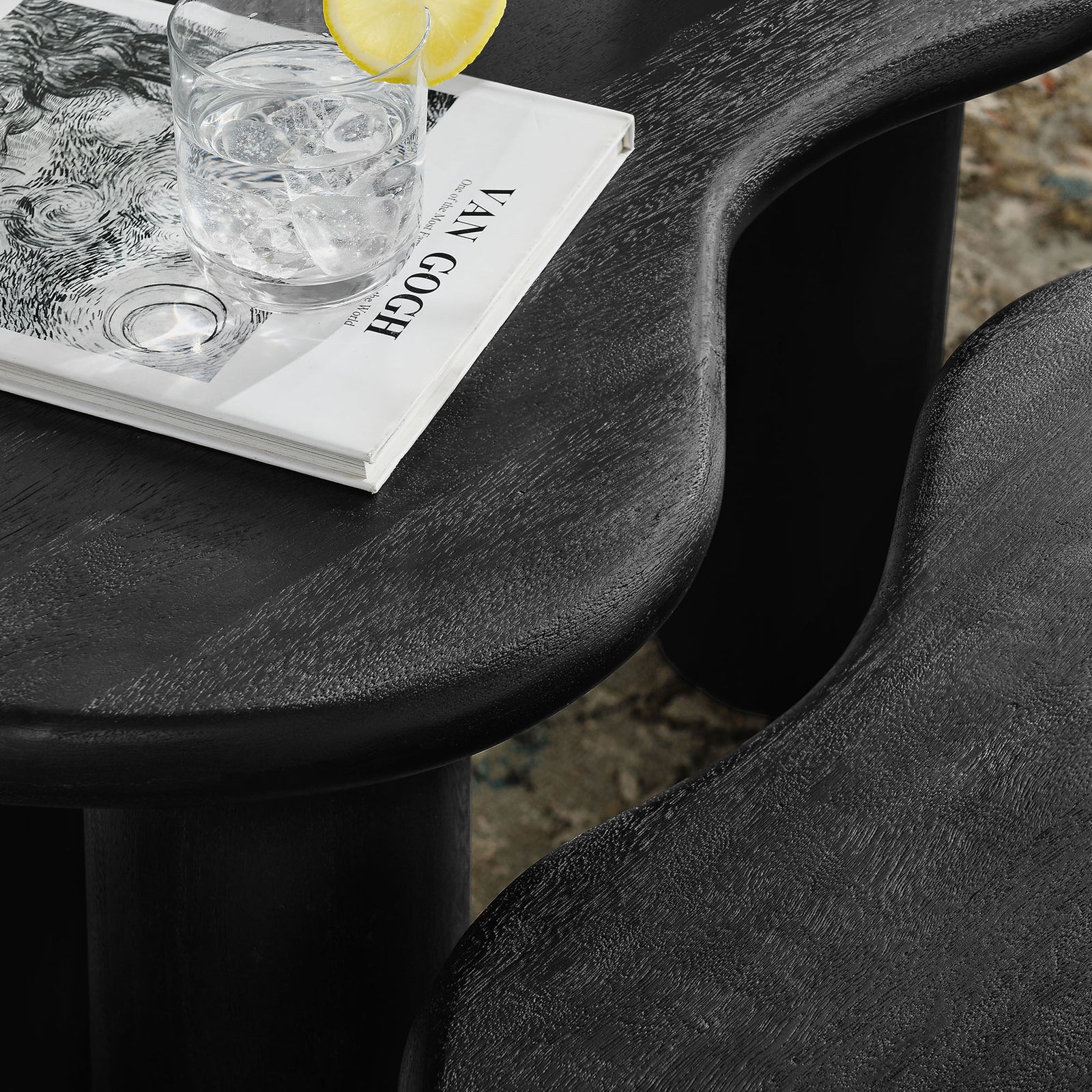 Smooth curved tops and substantial cylindrical legs create an organic modern focal point || EEI-7283-BLK || detail_room