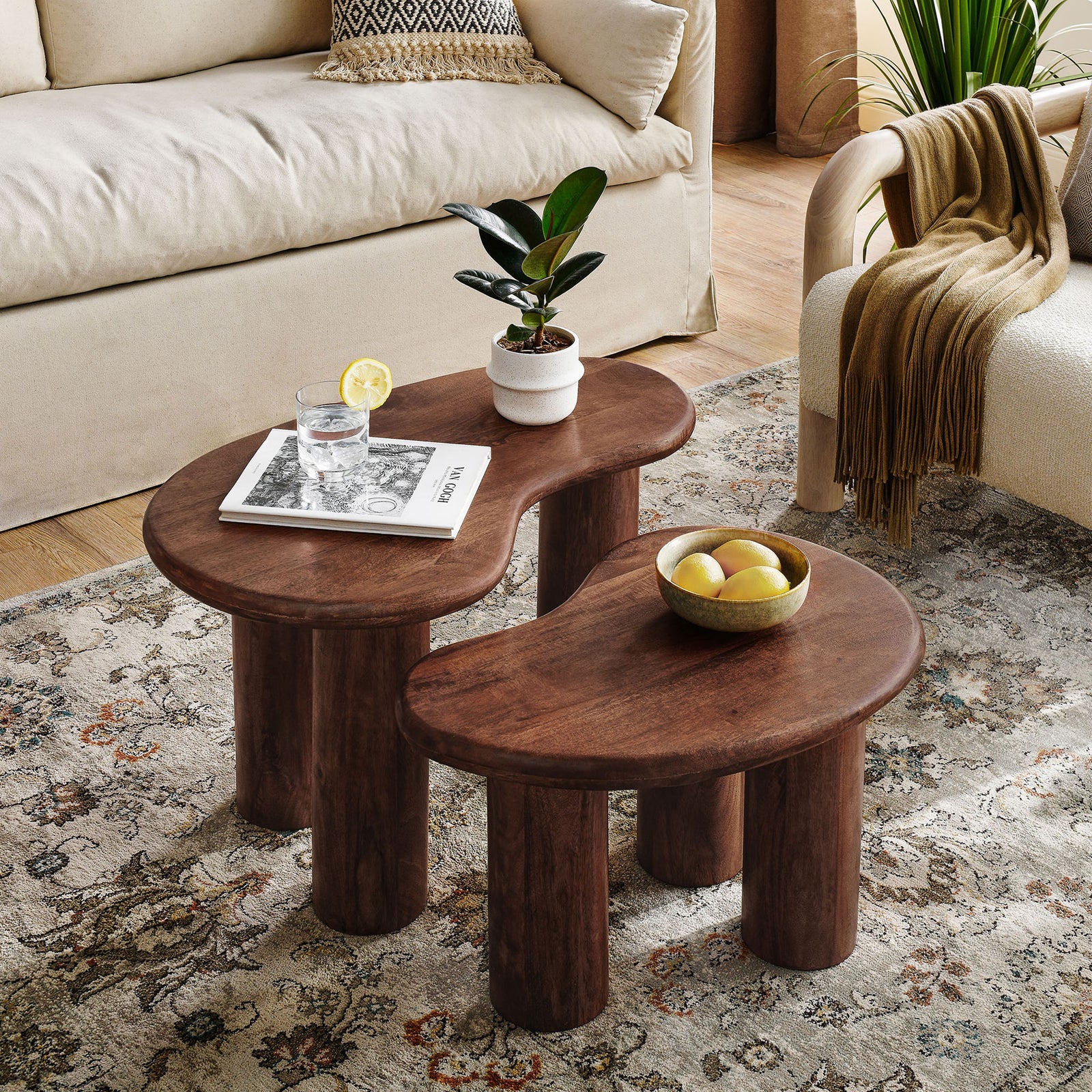 Nested tables add warm, modern character with chunky cylindrical legs and a rich walnut finish || EEI-7283-WAL || front_angle_room